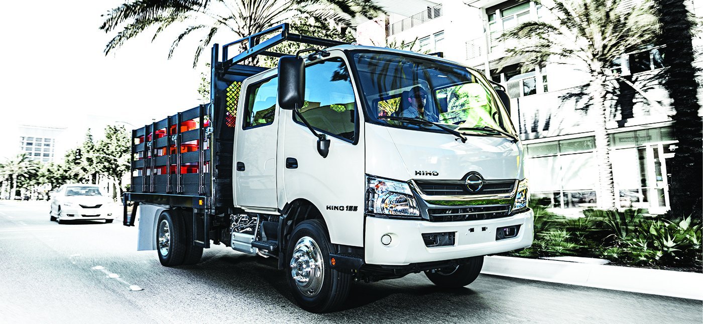Hino cab over stake bed truck