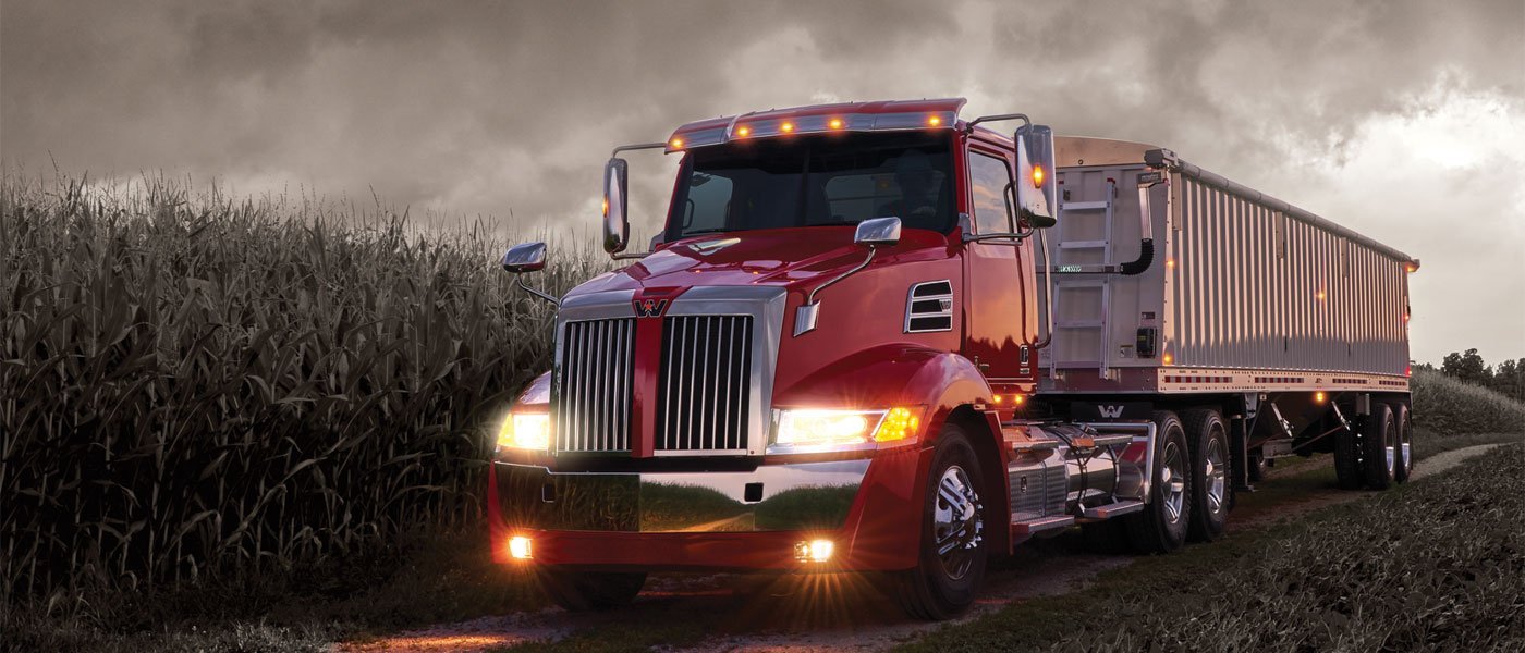 Red Western Star tractor pulling a bulk trailer